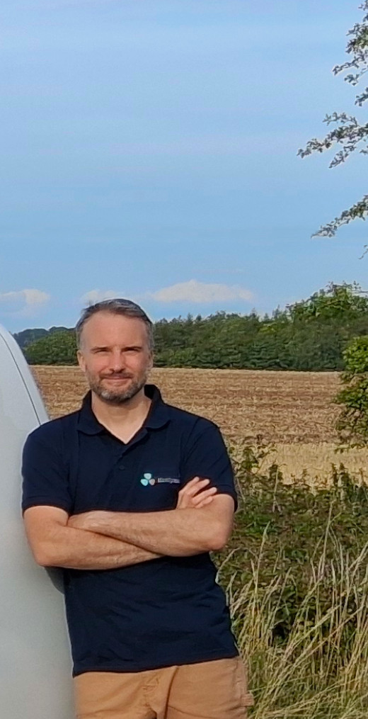 The Private Estate Handyman standing by his van in the countryside